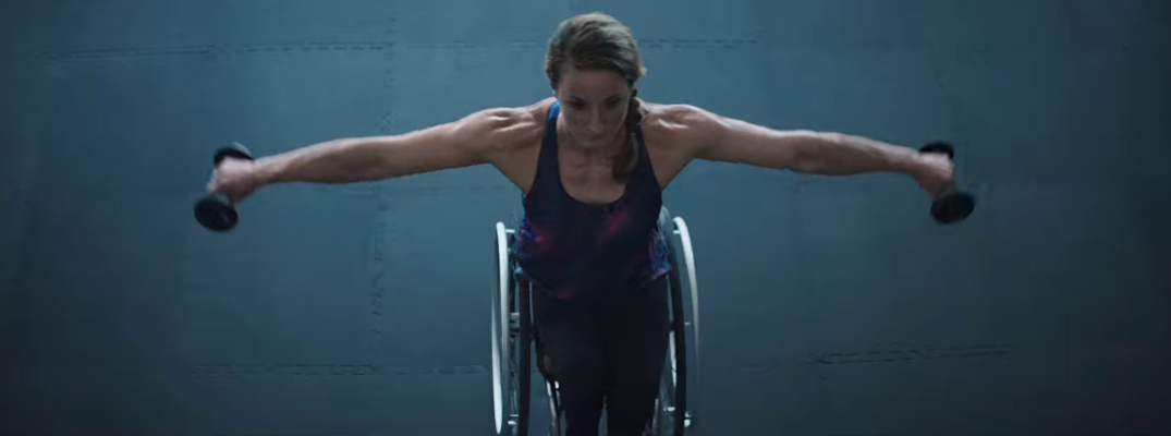 Woman Holding Dumbbells in Toyota Mobility for All TV Commercial