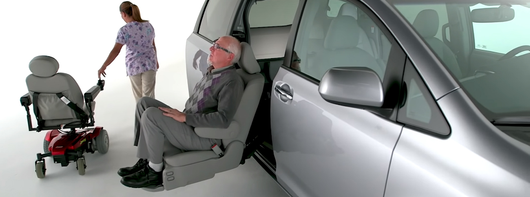Man Sitting in the Toyota Sienna Auto Access Seat