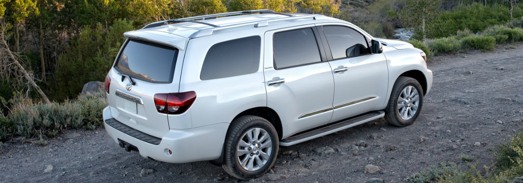 White 2018 Toyota Sequoia Driving on a Gravel Road
