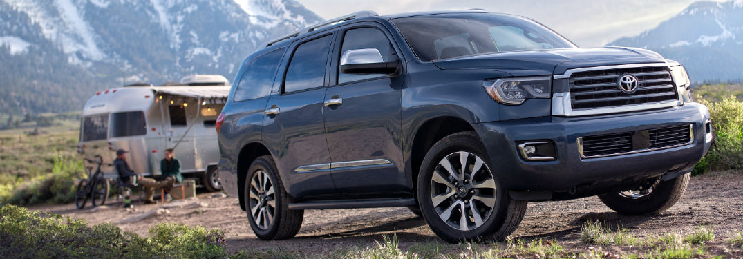 2018 Toyota Sequioa exterior front fascia and passenger with camper and people behind