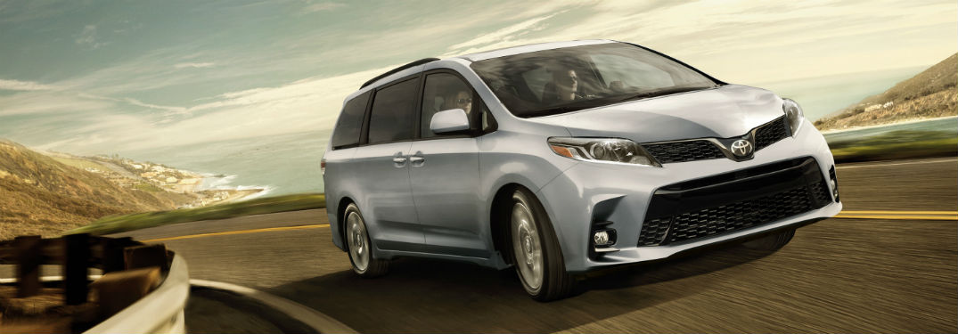 2018 Toyota Sienna exterior front fascia and passenger side going fast on blurred road