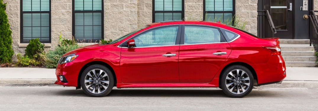 Side view of a red 2019 Nissan Sentra