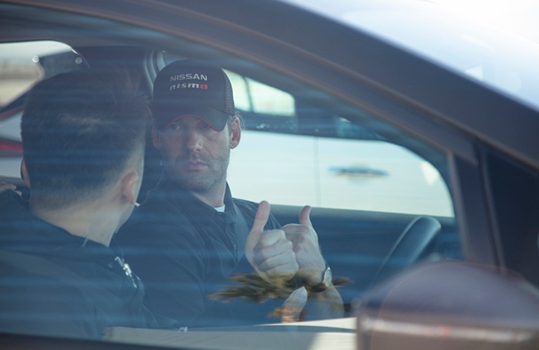 two men testing out the Nissan’s e-4ORCE technology