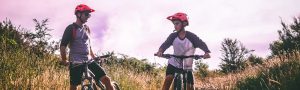 father and son riding bike