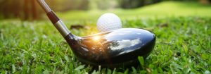 golf ball and club