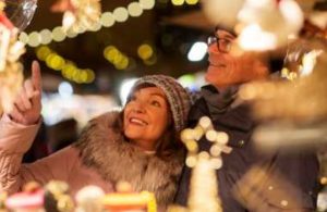 couple looking at lights