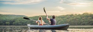 couple kayaking on river