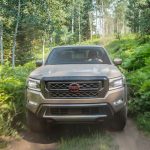 2022 Nissan Frontier tan front view on trail_o