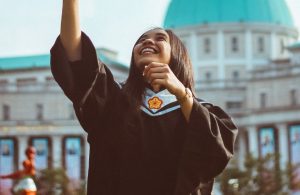 A student in her graduation robe
