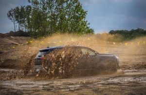 2022 Nissan Pathfinder in a muddy terrain