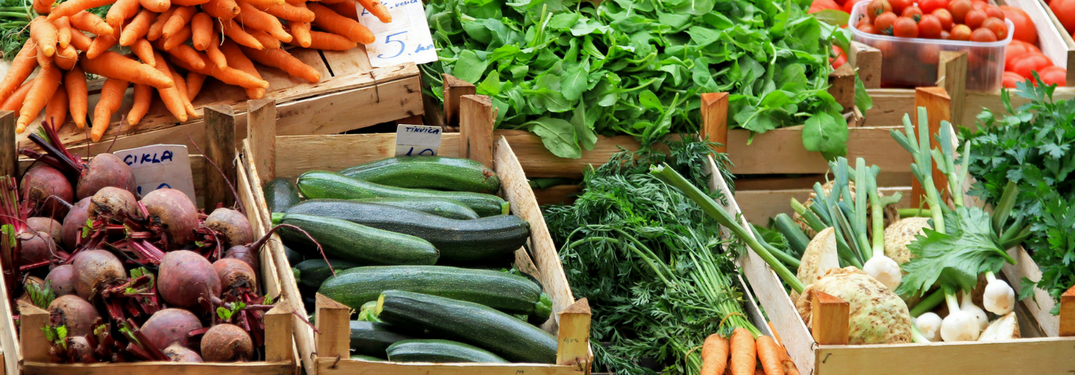 Boxes of Fresh Vegetables at a Farmers Market