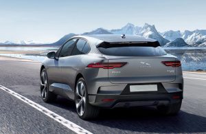 2020 Jaguar I-PACE driving towards the snow covered mountains