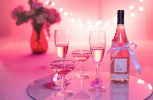 Champagne bottle and glasses on fancy tray