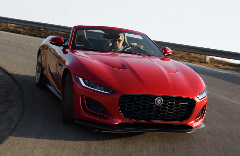 2021 Jaguar F-TYPE convertible going around a corner