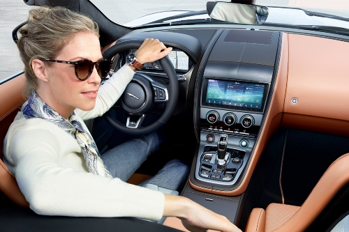 person sitting in 2022 F-TYPE