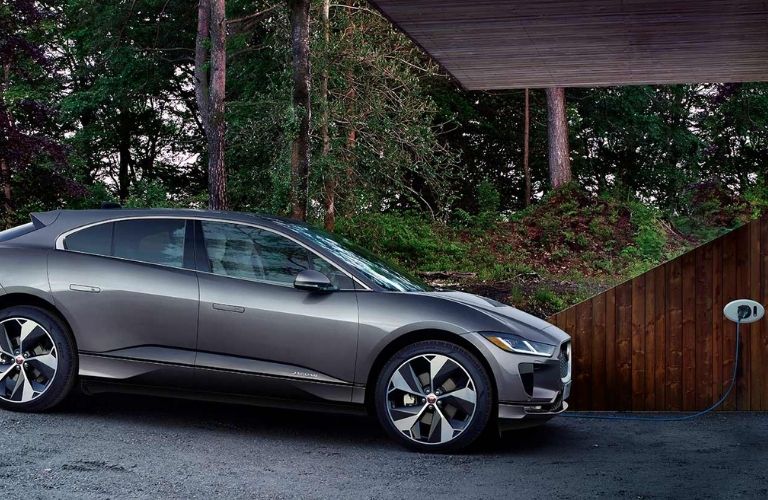 side view of a 2022 Jaguar I-Pace being charged