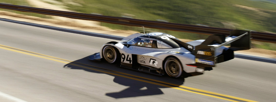 Volkswagen I.D. R Pikes Peak exterior shot on mountain climb as the background blurs due to speed