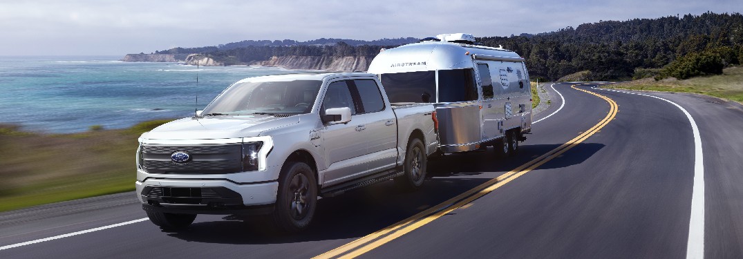 2022 Ford F-150 Lightning towing an Airstream trailer