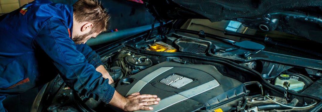 Mechanic working on engine