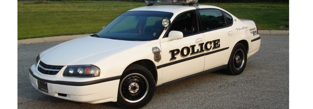 One police color is running on the road
