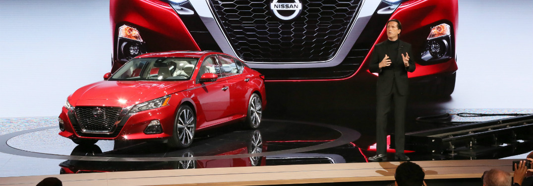 red 2019 nissan altima on display at 2018 new york international auto show