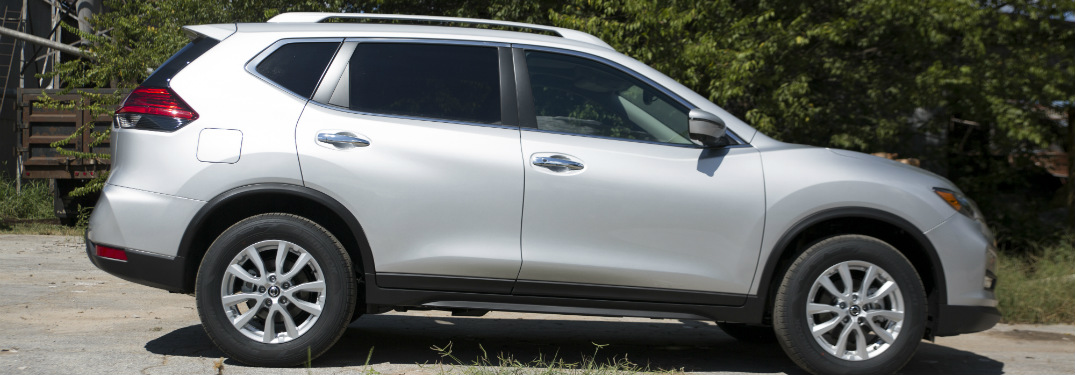 side view of silver 2018 nissan rogue