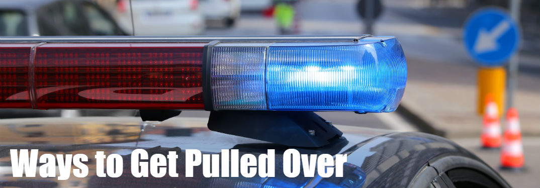 Top 10 Ways to Get Pulled Over with a close-up of police lights