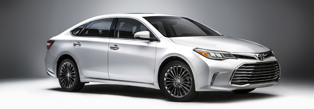 full view of white 2018 toyota avalon against white background