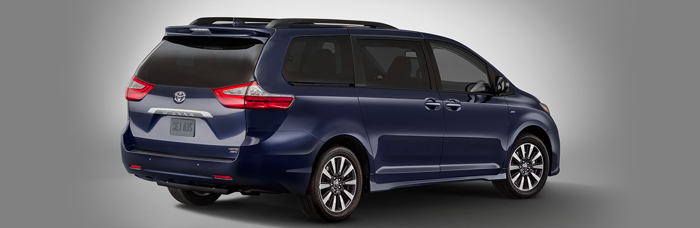 Black 2018 Toyota Sienna parked in a showroom
