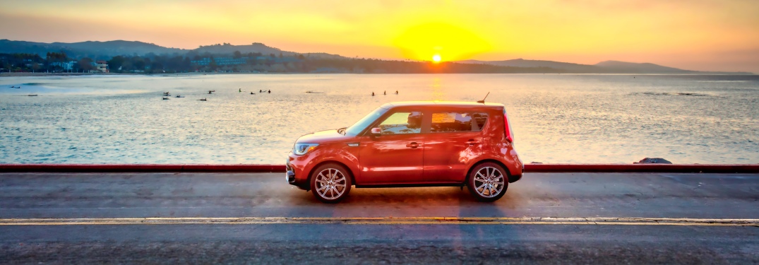 2019 Kia Soul driving in front of sunset