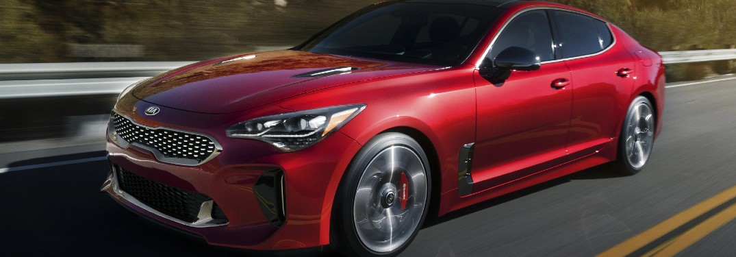 2021 Kia Stinger red exterior front fascia driving on highway