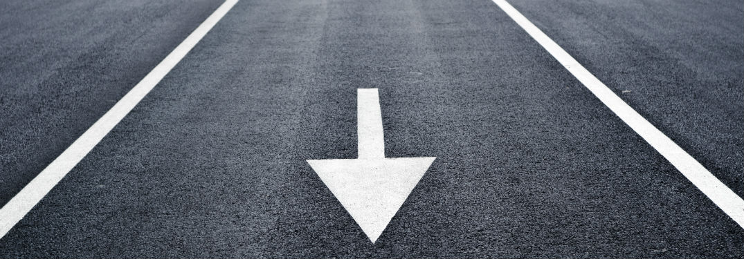 arrow lane marking on road