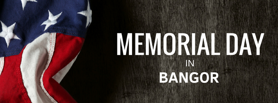 Close Up of American Flag on a Wood Background with White Memorial Day in Bangor Text