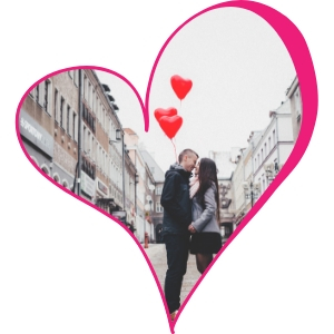 Pink Heart Outline with Couple Kissing on a City Street with Red Heart Balloons