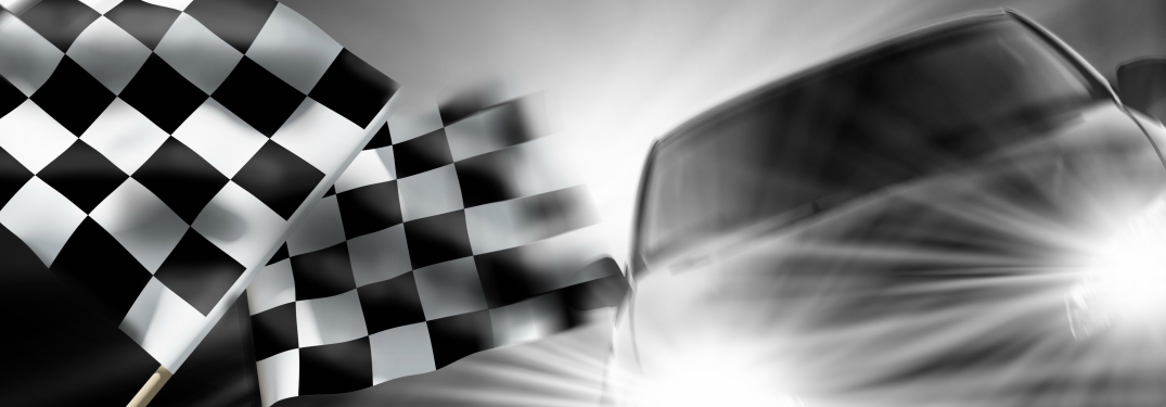 car headlights and checkered flags