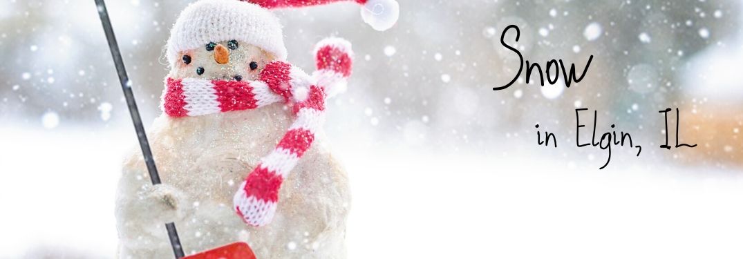 A snowman stands with a shovel. Text beside him says, "Snow in Elgin IL."