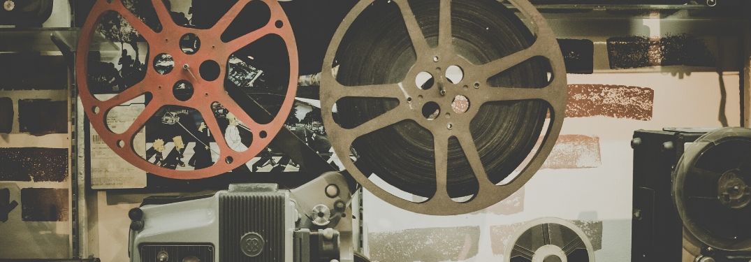 Close-up on two big wheels of film tape