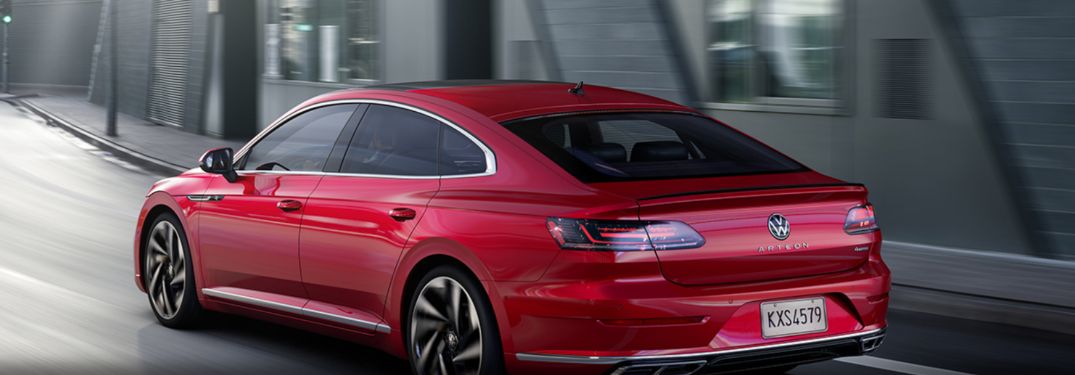 2021 Volkswagen Arteon driving down a forest road