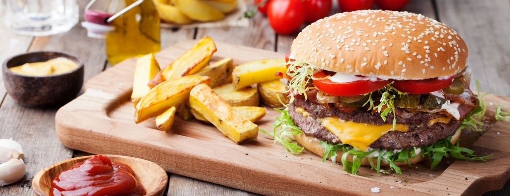 Burger and fries with dips