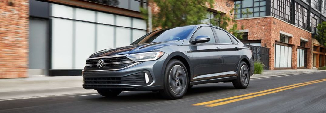 2023 Volkswagen Jetta Gray driving on the road