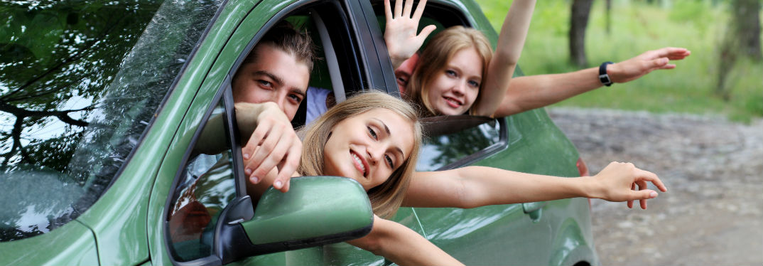 Planning for a Summer Road Trip with image of friends in a car going on a trip