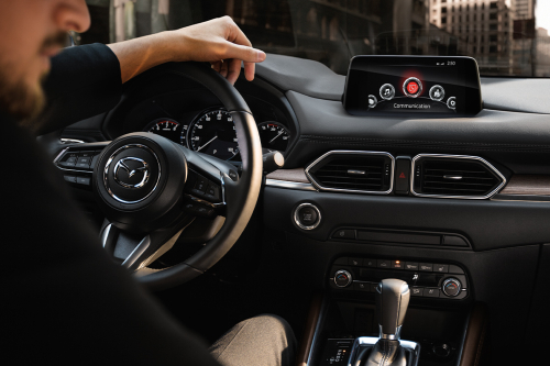 2020 CX-5 cockpit with driver in seat