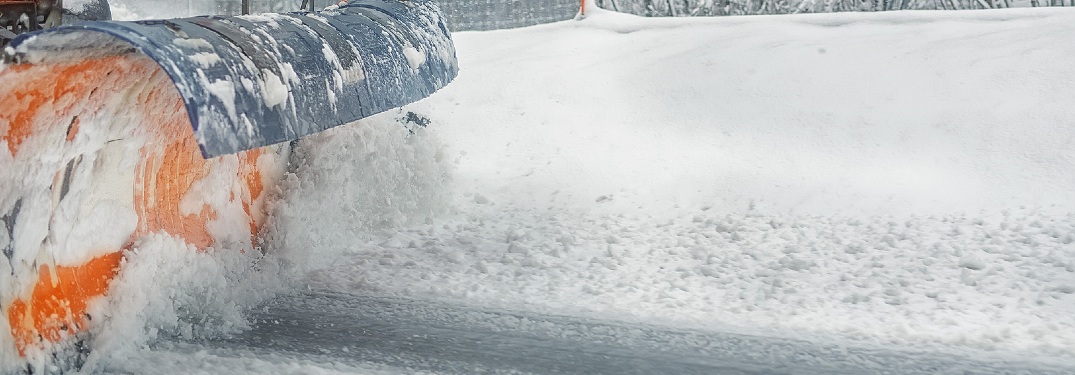 Snowplow pushing snow