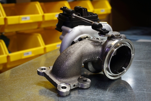 turbocharger sitting on a metal table