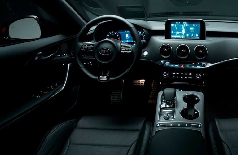 2018 Kia Stinger steering wheel and dash view.