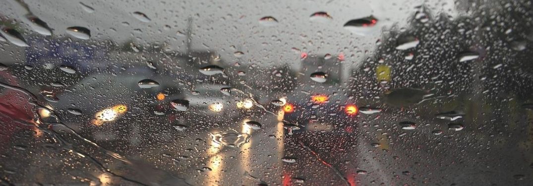 Cars driving in the rain and storm