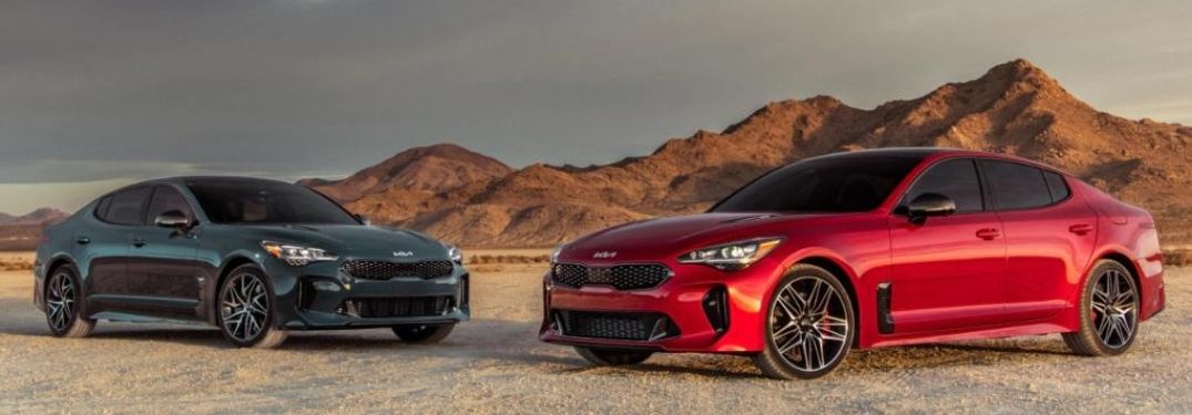 Two 2022 Kia Stinger facing each other