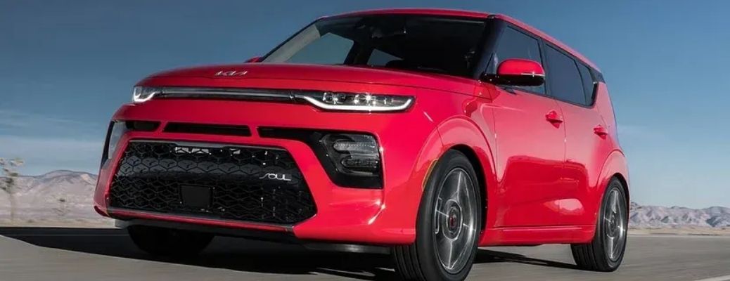 View of the 2022 Kia Soul in red on road