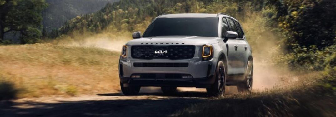 A 2022 Kia Telluride being driven on a gritty terrain