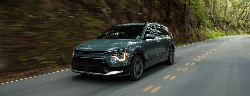A 2023 Kia Niro on a smooth road
